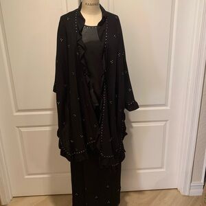 Elegant Black Embellished Cape to and skirt Set
3 pc.
KNIT